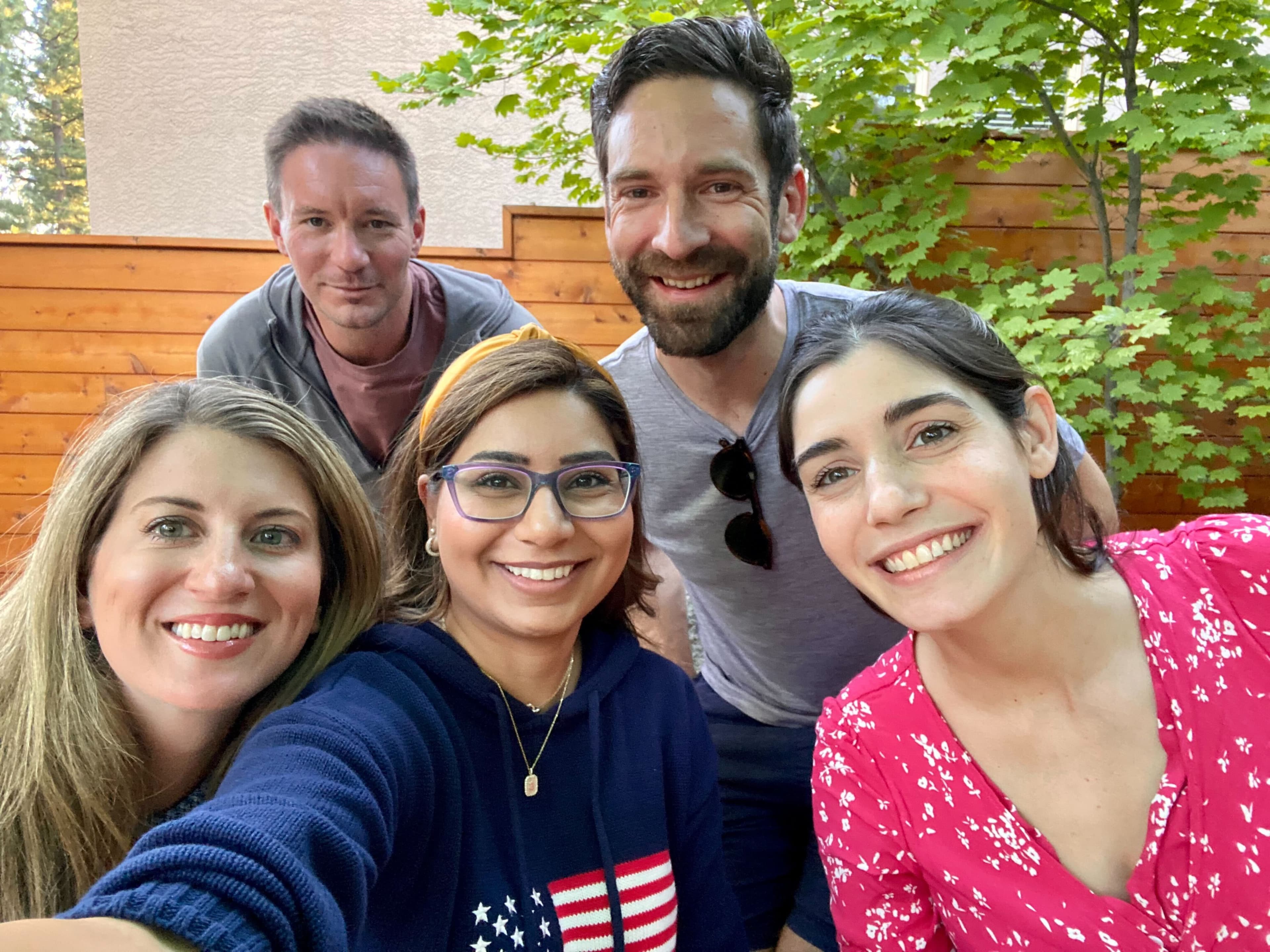 1440 team smiling together